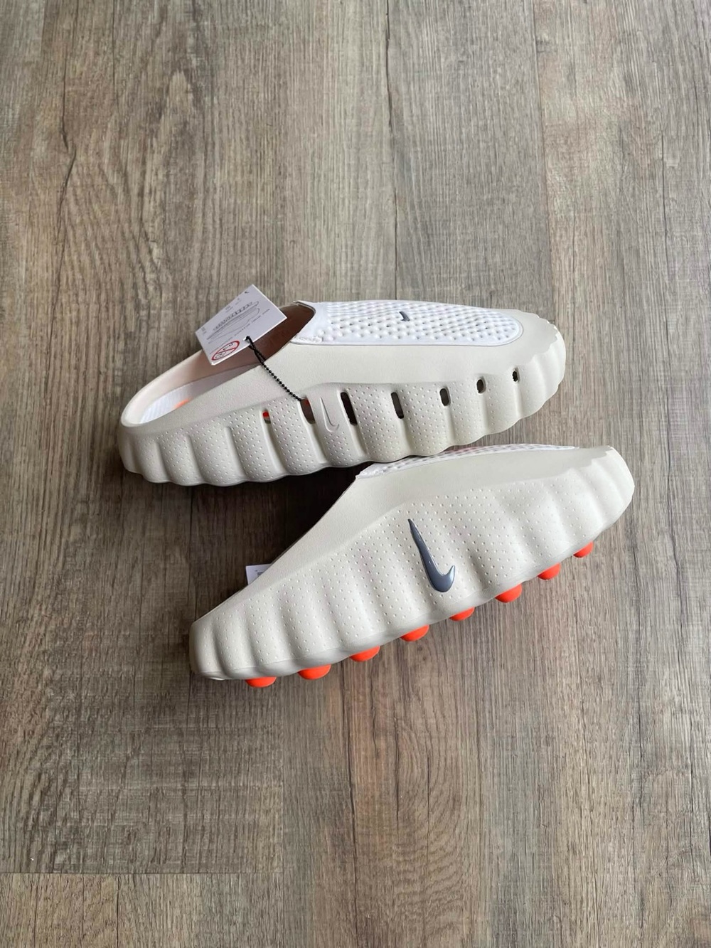 Nike Cream Slide Sandals with Orange Outsole and Navy Swoosh